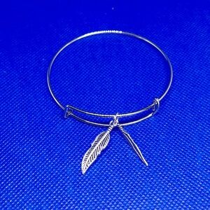 Feather charm bracelet